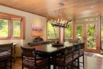 The space opens to a splendid dining area with gleaming oak floors